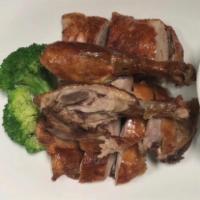 Crispy Duck  · Served with choice of white or brown rice.