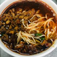 Shanghainese Spicy Pork Noodles in Soup · Diced pork and bok choy served with Bund special broth. Spicy.