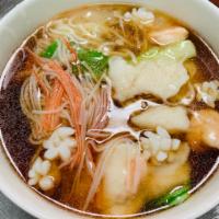 Seafood Noodle Soup · shrimp, squid, fish fillet and vegetables in broth with noodles. 
