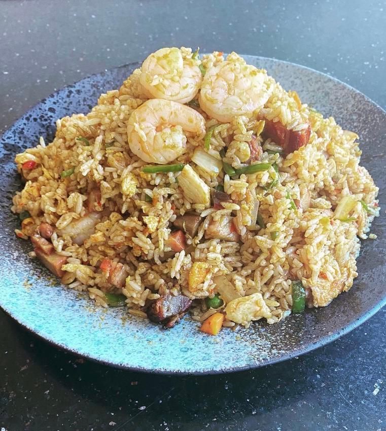 Singapore Fried Rice · New delicious fried rice mixed with shrimps, roast pork and chicken in curry flavor. Spicy.