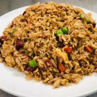 Fried Rice with Roast pork, Chicken or Vegetables · Prepared steamed white rice, soy sauce, eggs, peas, carrots and green onions.