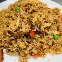 Fried Rice with Beef or Shrimps · Prepared steamed white rice, soy sauce, eggs, peas, carrots and green onions.