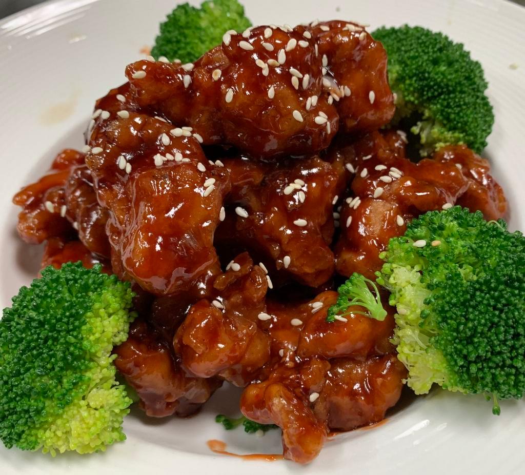 Sesame Chicken · Dark meat. Chunks of tender chicken lightly fried with chef's special sauce and sesame sauce. Served with choice of rice.