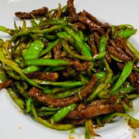 Shredded Beef with Hot Pepper · Stir-fried beef with hot peppers. Served with choice of rice. Spicy.