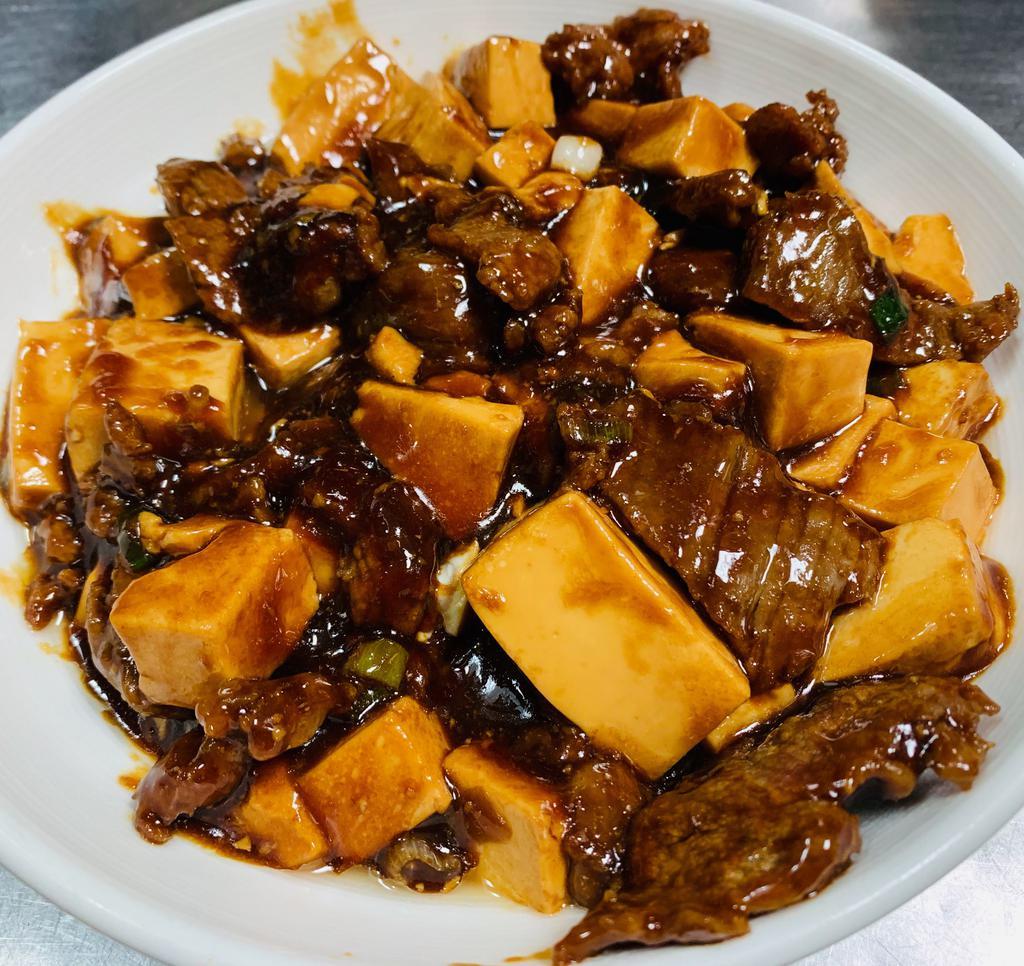 Beef with bean curd · Served with rice.