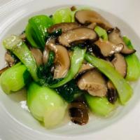 Baby Bok Choy Sauteed with Chinese Mushroom · Served with choice of rice. Vegetarian.