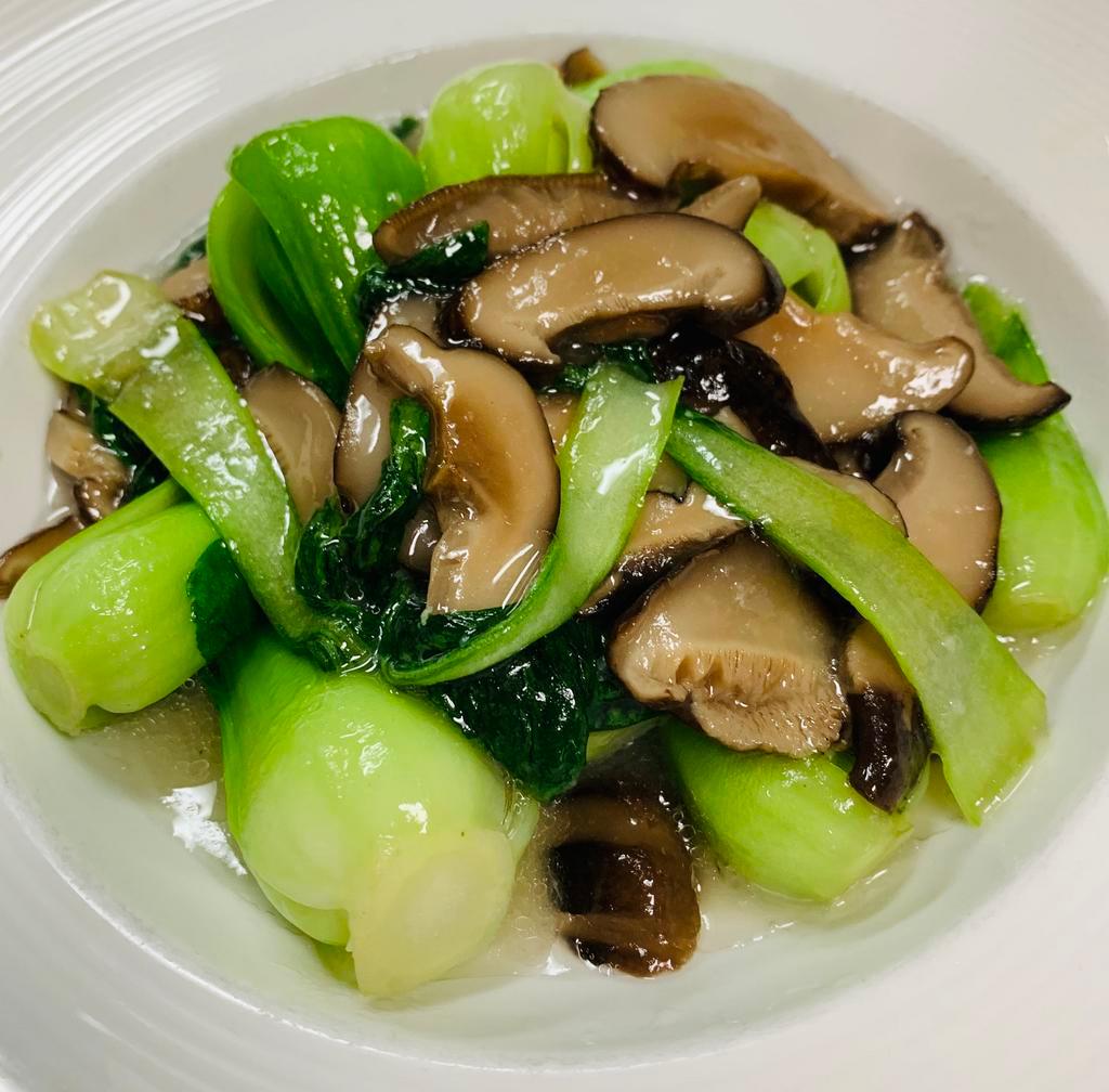 Baby Bok Choy Sauteed with Chinese Mushroom · Served with choice of rice. Vegetarian.