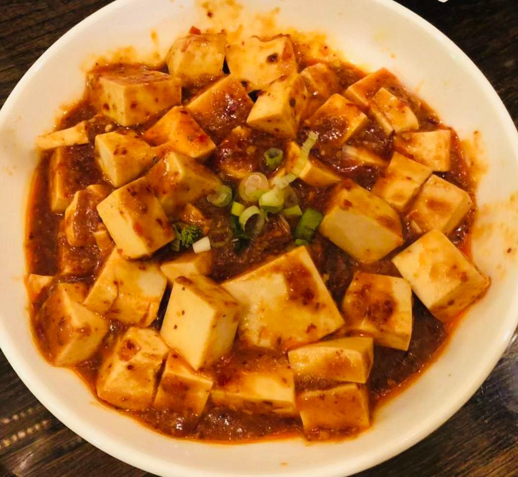 Mapo Tofu  · Spicy. Soft tofu stir fried in spicy sauce. Served with choice of rice. Spicy. Vegetarian.