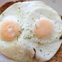 2 Eggs · On a toasted roll bread.