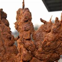 Beef Suya · 5 Sticks  of thinly sliced grilled beef with Nigerian Suya spices.