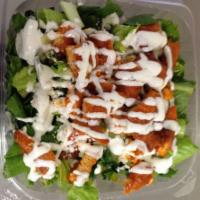 Buffalo Chicken Finger Salad · Crumbled bleu cheese, celery and tomato.
hot/med/mild