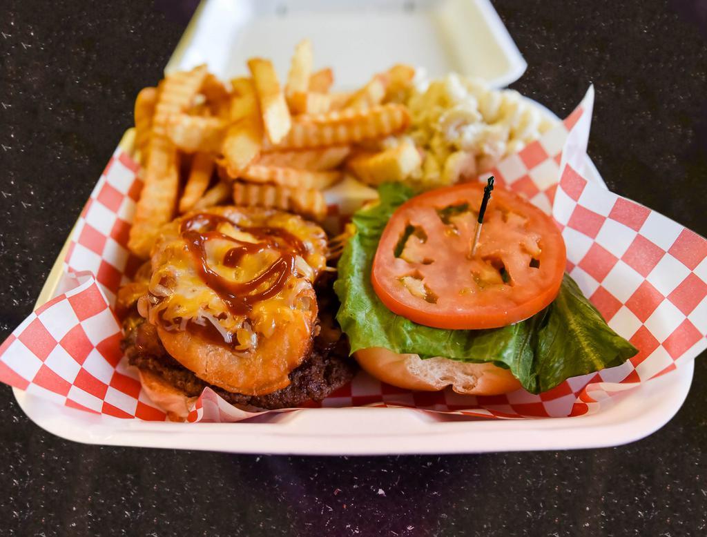 1/2 lb. Cowboy Burger Combo Meal · Bacon, onion rings, cheddar cheese and BBQ sauce. Served with fries, mac salad and fountain drink.
(Comes dress)