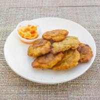 Fried Plantain  · Tostones. 