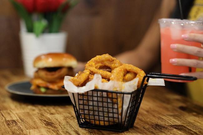 Peri-Onion Rings ( 6pcs ) · 6pcs of Peri-Fried Onion Rings- tossed in mild sauce, served with peri mayo for dipping!