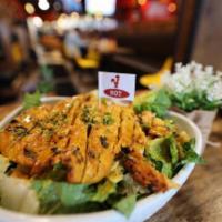 Chicken Cesar Salad · Peri Chicken, chopped romaine, shaved parmesan, croutons, black pepper & of course caesar dr...