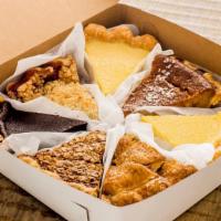 Box of 7 Slices - Baker's Choice · Chosen by the staff at the time of order. *Specific flavor requests are not guaranteed 