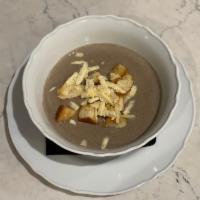 Creamy Mushroom Soup · With homemade croutons, cheese crumbles