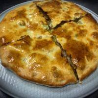 Kubdari Meat Stuffed Pie · Finely chopped grass fed beef pie and caraway and blue fenugreek.