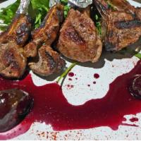 Grilled Baby Lamb Chops · Chargrilled Marinated New Zealand Lamb Chops Red Wine Sauce, Fig Confit, Grilled Asparagus