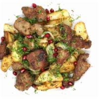 Ojakhuri · Pen-fried potatoes with pork loin, caramelized onions, pomegranate