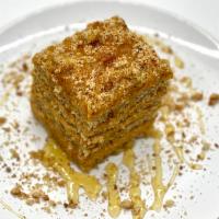 Ideali  · Layered honey walnut cake and dolce de leche.