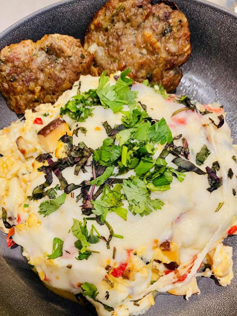 House-backed Bread · Baked Scrambled Eggs with Shitake Mushrooms, Stretchy Cheese, Opal Basil, Fresh Dill, Homemade Beef and Pork Sausage Patties