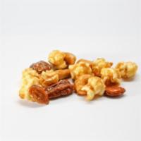 Caramel Nut Popcorn · Caramel and premium mixed nuts. Cashews, almonds, pecans and some peanuts! Classic popcorn.