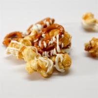 White Chocolate Pretzel Popcorn · Caramel popcorn with pretzels drizzled with white chocolate.