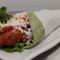Buffalo Chicken Wrap · Buffalo chicken tenders, cheese, lettuce, tomato, and ranch in a tortilla wrap. Wraps come w...