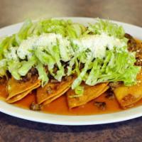 Tacos Dorados  · 4 pieces. Four tacos dorados with potato, beef, topped with lettuce and queso fresco.