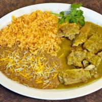 Costillas en Salsa Verde · Ribs dressed in tomatillo sauce, served with tortillas, rice and beans.