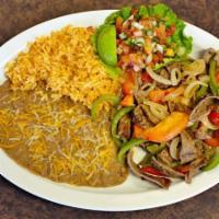 Fajitas · Served with green and red pepper, grilled onion, pico de gallo, rice and beans with 4 tortil...