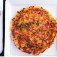 Masala Uthappam · South Indian soft pancake made of rice and lentil topped with onions, tomatoes, green chilie...
