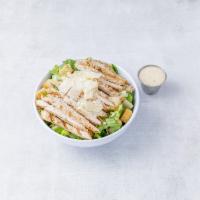 Pollo Caesar Salad · Strips of grilled marinated chicken breast over romaine salad, garlic crouton and creamy Cae...