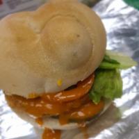 Vegan Buffalo Chicken Sandwich   · Vegan blue cheese, Buffalo sauce, vegan chicken patty, pickle, lettuce, tomato and served on...