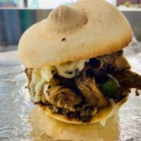 Vegan Philly Steak Sandwich · Vegan seitan steak, peppers, onions, and mushroom, diaya mozzarella and vegan mayonnaise, se...