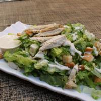Chicken Caesar Salad · Chicken breast, croutons, Parmesan cheese, romaine lettuce and Caesar dressing.