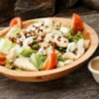 The Wobbs Salad · Crisp romaine, smoked bacon, grilled chicken, vine ripe tomatoes and Gorgonzola.