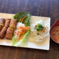 1. Imperial rolls · *Contains Peanuts*
Vietnamese style deep fried eggrolls w/ homemade fish sauce and vermicell...