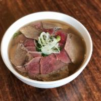 10. Well-Done Beef, Rare Beef Noodle soup (Filet mignon) · Well done sliced flank steak & flat rice noodles served in beef broth topped w/ sliced rare ...