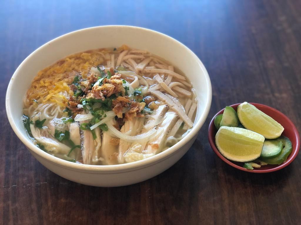 19. Combo Vermicelli Noodle Soup · Shredded Vietnamese ham, chicken & egg in chicken broth topped w/ dried shallots, onions & scallion served with your choice of rice noodles (flat or vermicelli)

