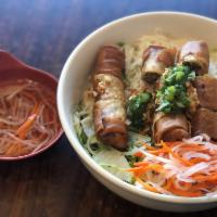 30. Fried egg roll with vermicelli · *Contains Peanuts* Deep fried egg roll topped w/ peanuts, scallion, lettuce & shredded cucum...