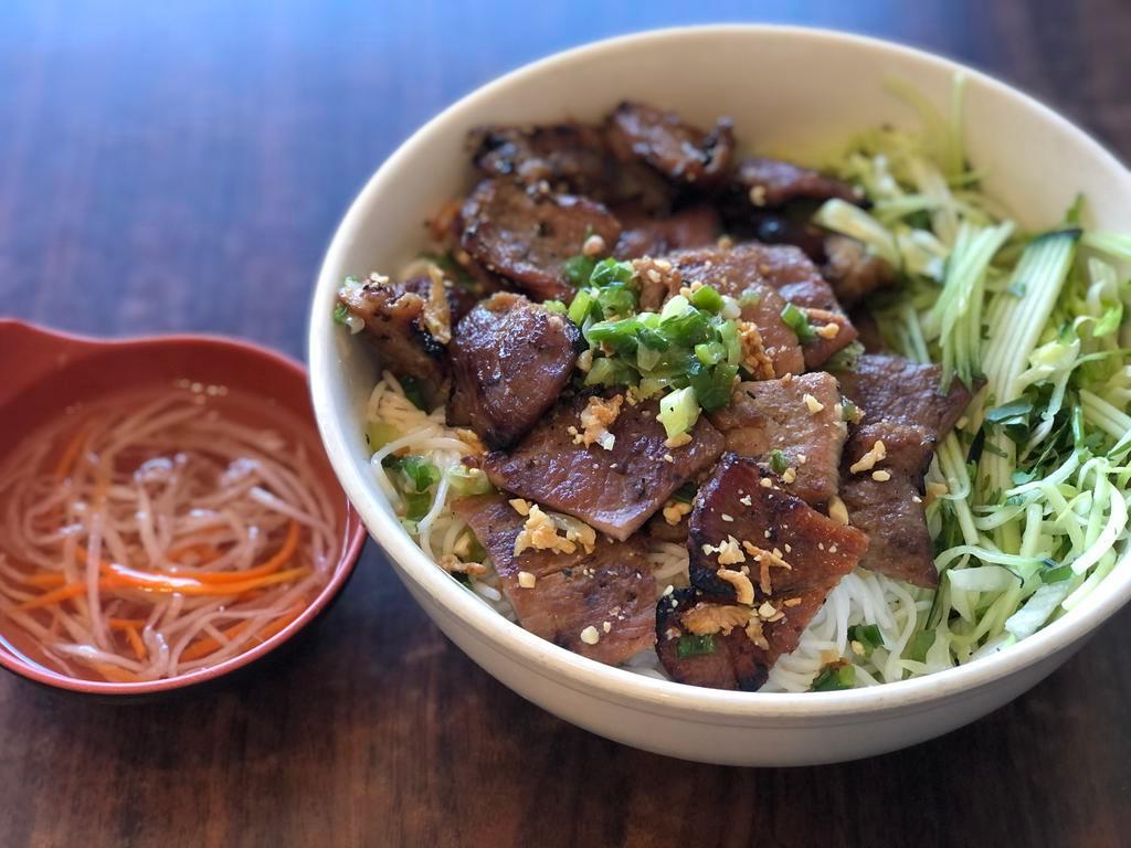 31. BBQ pork with vermicelli · *Contains Peanuts* Flame grilled BBQ pork topped w/ peanuts, scallion, lettuce & shredded cucumber served w/ homemade fish sauce on the side
