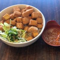 35. Fried Tofu with Vermicelli · *Contains Peanuts* Deep fried tofu cubes topped w/ peanuts, scallion, lettuce & shredded cuc...
