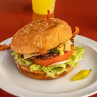 Famous Vega’s Burger · Bacon, special sauce, pepper jack, jalapeno, grilled onions, lettuce, and tomato. Served wit...
