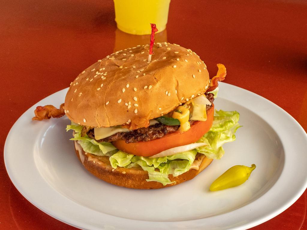Famous Vega’s Burger · Bacon, special sauce, pepper jack, jalapeno, grilled onions, lettuce, and tomato. Served with dressing, onions, lettuce, tomato, and pickles. 