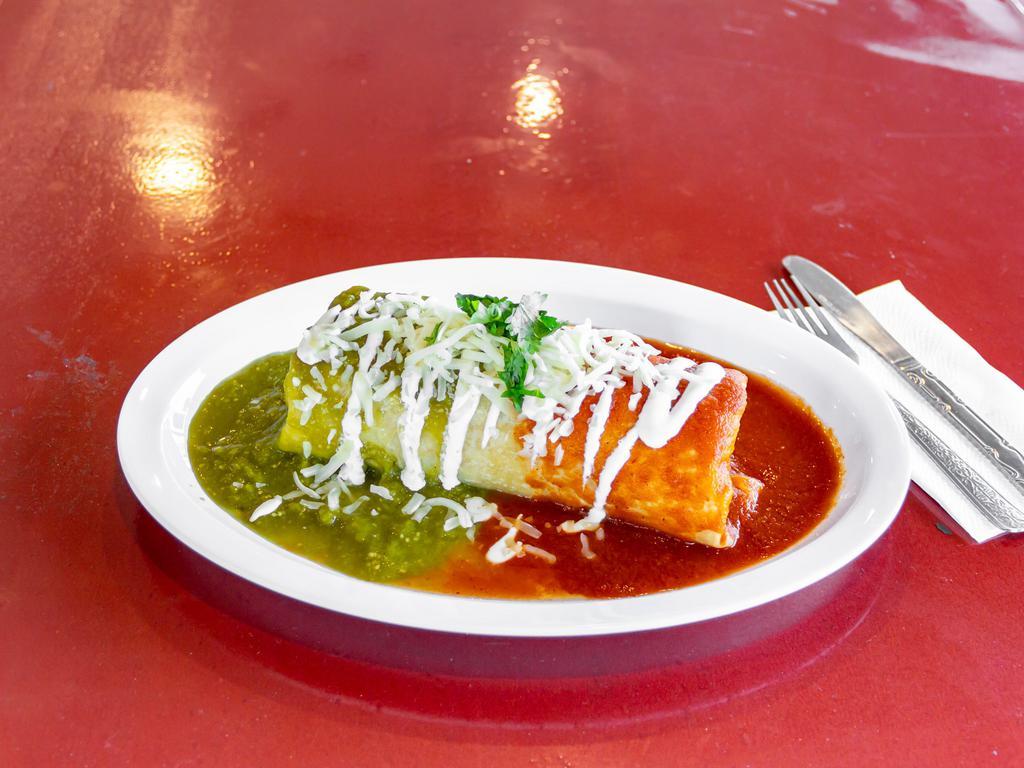 Wet Burrito · Comes with rice, beans, onions, cilantro, and green or red salsa.

