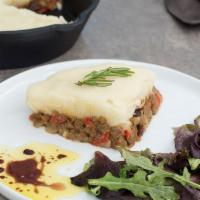 Shepherd's Pie (GF) · Homemade style meatless pie with potatoes, red pepper, onion, scallions, raisins, olives, or...