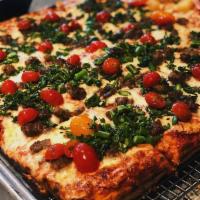 Fresh Veggie Pizza · House red sauce, mozzarella, and a selection of mushrooms, red and green peppers, onions, ch...