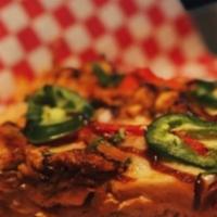 BBQ Chicken Pizza · House-smoked pulled chicken, red onions, house BBQ sauce, mozzarella, jalapenos, and fresh c...